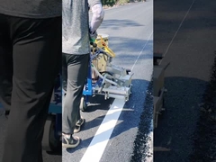 How does the hot melt spray road machine work?